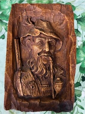 Most likely Hand-Carved Brown Wood Wall Sculpture – Rustic Bearded Man with Pipe